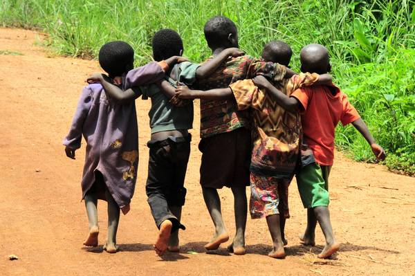 children walking together in Zambia
