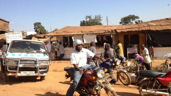 Man on motorbike in Uganda