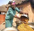 Women processing rice in ghana
